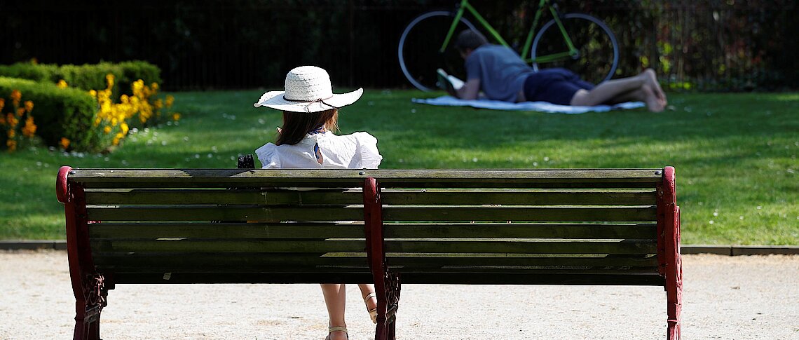 People relax in Battersea Park, south west London Reuters